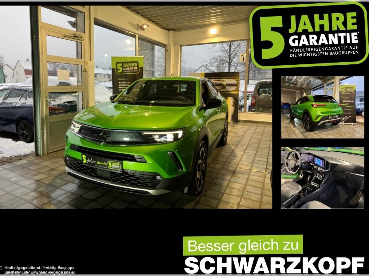 Opel Mokka-e Fin. ab 2,99% Navi,Rückfahrkamera,Sitzhei Leasing